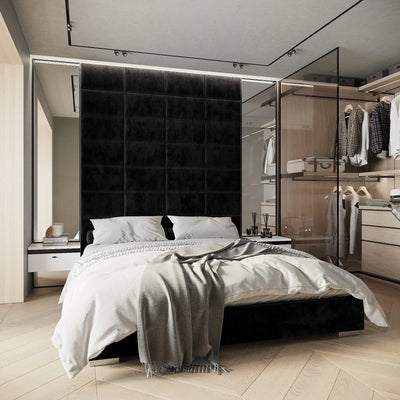 Schwarze Polsterpaneele als luxuriöses Kopfteil im modernen Schlafzimmer und hochwertige Wandpaneele aus Samt für stilvolle Raumgestaltung.